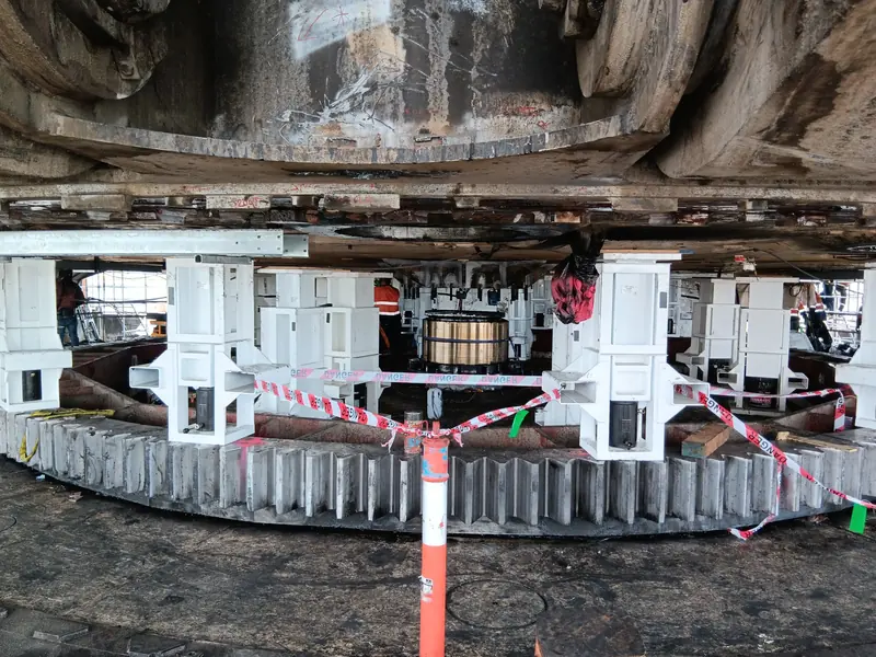 Dragline tub raised on hydraulic jacking stands exposing the swing rack and centre pin