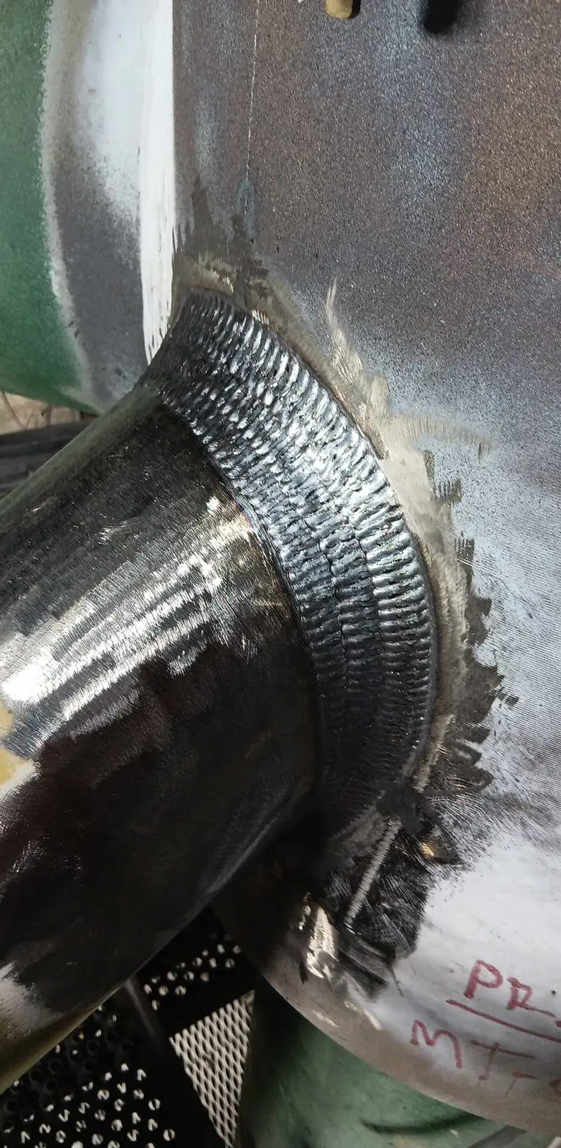 Multi-pass structural weld joining a tube into a plate